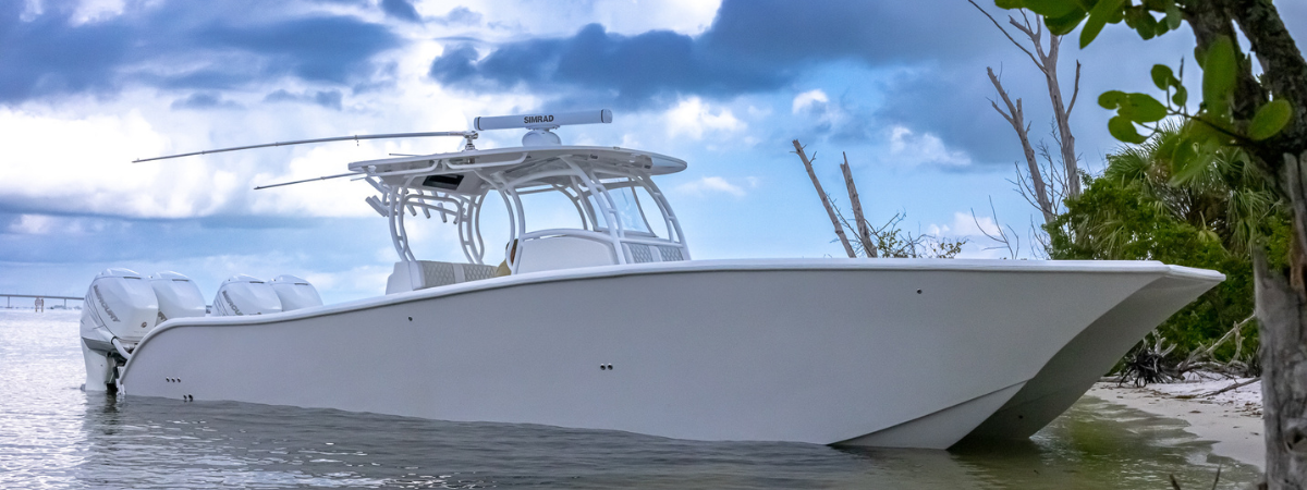 Quad Engine White Center Console On The Beach Ospreyyachtsales.com